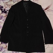 Шикарный чёрный пиджак качество отличное. Не сток.