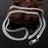 Серебряная цепочка 925 пробы. Длина 55 см, ширина 5 мм.