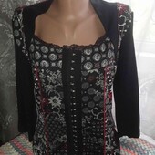 Фірмова трикотажна блуза,розмір М,але дивітьєся заміри