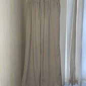 Широкі штани, світло-бежевого кольору