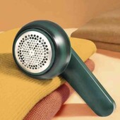 Аккумуляторна машинка для зняття колтунів. Дуже корисна річ в побуті.