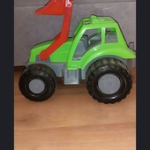 Трактор великий з ковшом в ідеальному стані