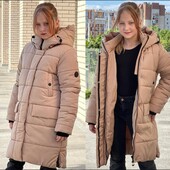 Зимова куртка-пуховик 146р