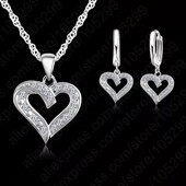 Шикарные крупные посеребряные серьги с цирконием.Проба 925.