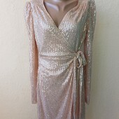 Сукня на запах в паєтках в 38 розмірі.