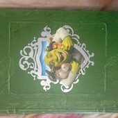 Медальйони Шрека в альбомі