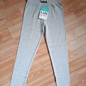 Фірмові легінси.