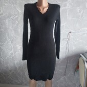 Дуже тепла в язана сукня.