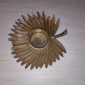 Золотистий підсвічник брак