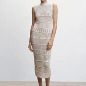 Ажурна в'язана бежева сукня міді