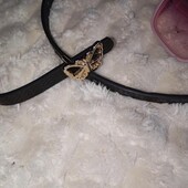 Чорний пасок з пряжкою метеликом