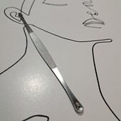 Какие -то инструменты! вроде для механической чистки лица серебристый