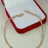 Нежный браслет 19,5 см, плетение жгутик. Позолота 585 пробы 18 К.