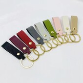 Брелок з екошкіри. молочний, коричневий.