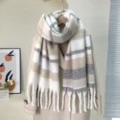 Крутий теплий шарф у ніжних відтінках