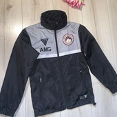 В ідеалі.Куртка вітрова ,підкладка сітка .