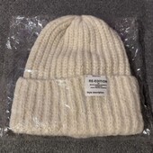 Нова жіноча шапка