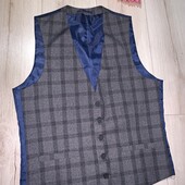 Новий стан.Класичний жилет НОГ 50см.38R.