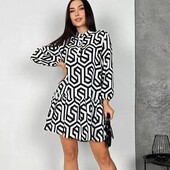 Жіноче вільне просторе плаття софт міді з воланом в стилі ретро.